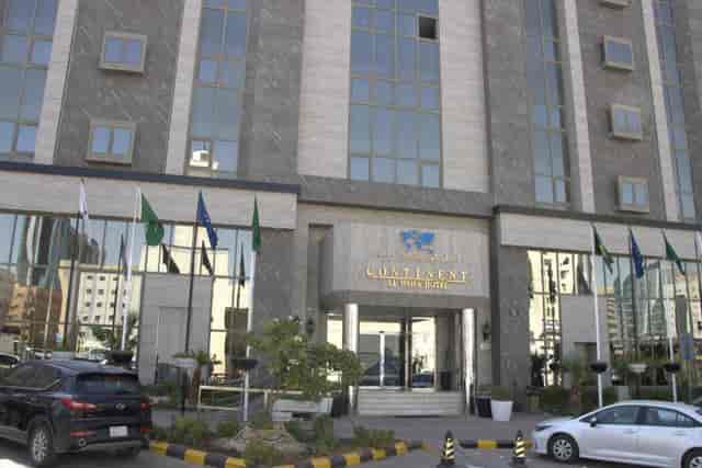 Modern hotel entrance at Continent Al Waha, ideal for corporate events and conferences.