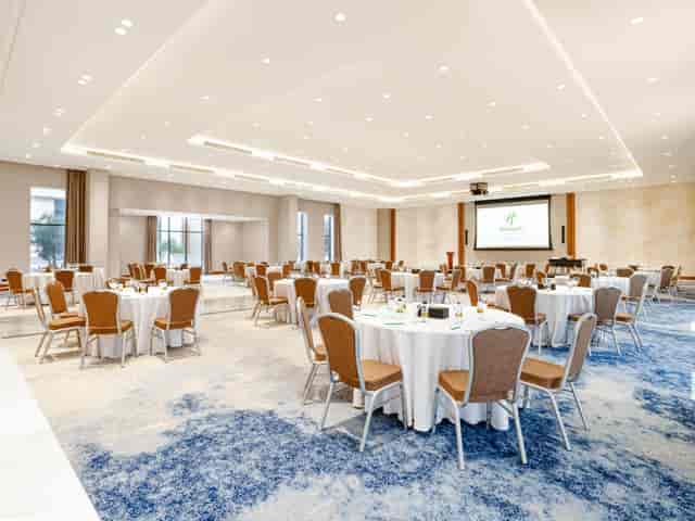 Business Hall at Meet At, elegantly arranged for formal meetings and banquets.