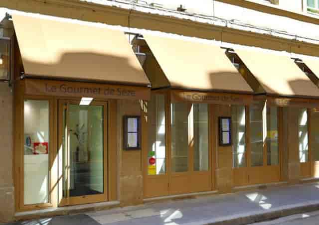 Elegant restaurant exterior with large windows, perfect for upscale events and gatherings.