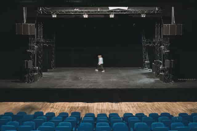 Concert hall stage setup in L'Épicerie Moderne for upcoming performances and events.