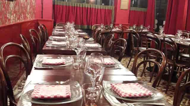 Elegant dining setup at Le Bouchon des Filles for intimate events and celebratory dinners.