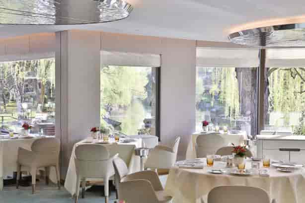 Elegant dining space at Auberge de l'Ill for executive meetings and intimate events.