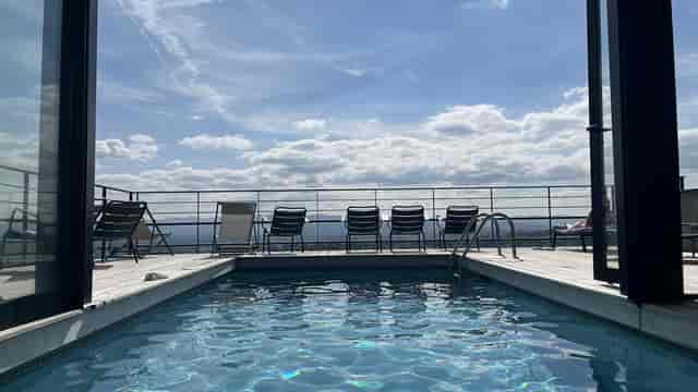 Rooftop pool at L'Etude, Ermitage Hotel - perfect for networking and leisure events.