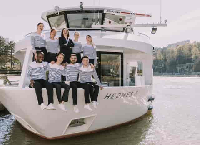 Stylish river cruise vessel "HERMES" for corporate events and networking in Lyon.