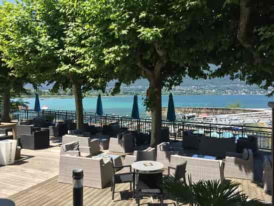 Outdoor event space at La Maison des Pêcheurs with stylish seating for conferences and gatherings.