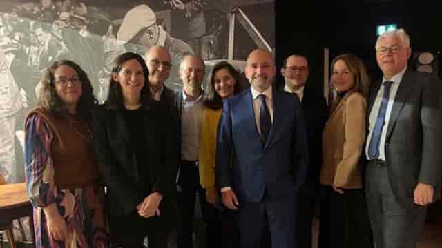 Yves Berger at professional networking event in upscale Lyon setting