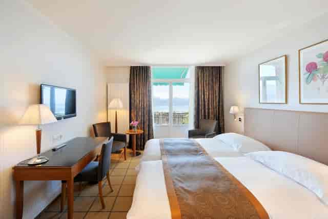Luxurious hotel suite with scenic views, perfect for conferences and events.