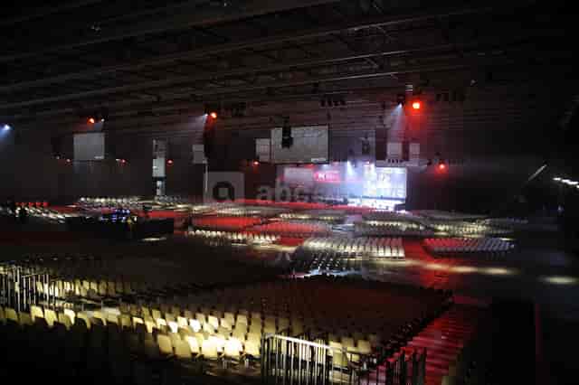 Paul Bocuse at Eurexpo Lyon, corporate event with illuminated stage and seating.