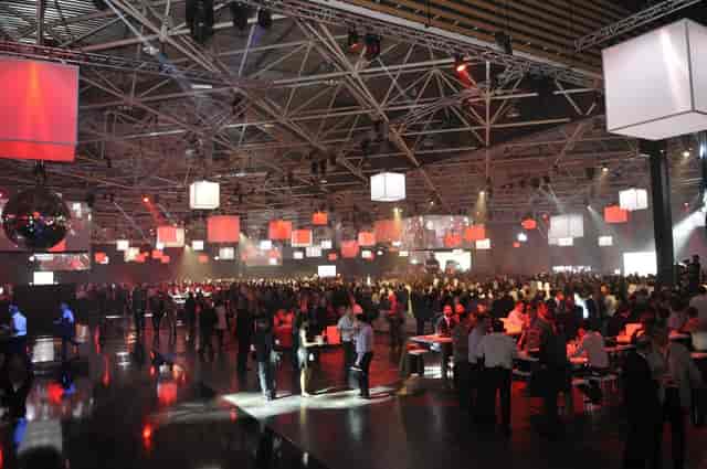 Paul Bocuse at Eurexpo Lyon, vibrant event with geometric lighting, networking opportunity.