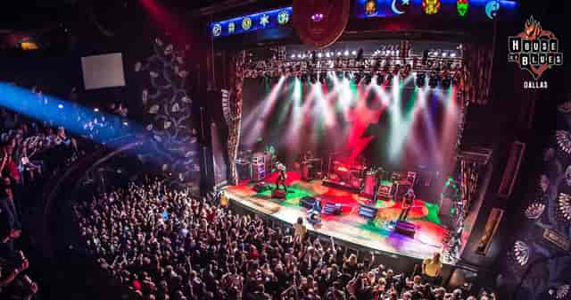 Vibrant concert at Music Hall, House of Blues Dallas with dynamic lighting and diverse crowd.