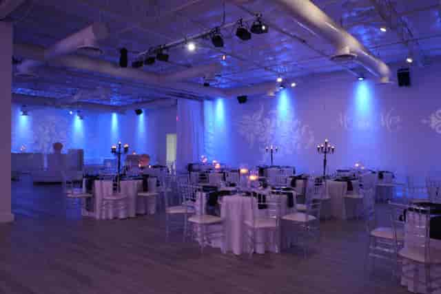 Elegant banquet hall with round tables, perfect for corporate and social events.