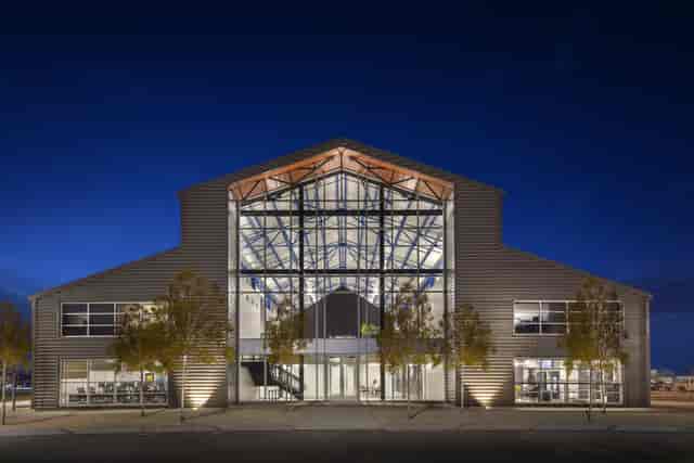 Atrium in The Cannon, modern venue with glass panels for events and gatherings.