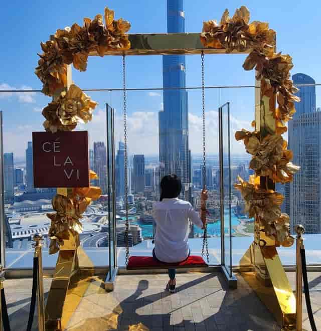 Upscale restaurant in Burj Khalifa with swing & city views, perfect for events.
