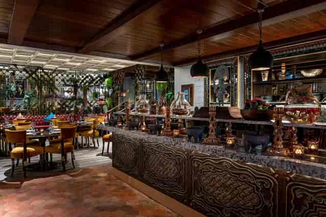 Semi-private dining area at COYA Doha, perfect for intimate gatherings and celebrations.
