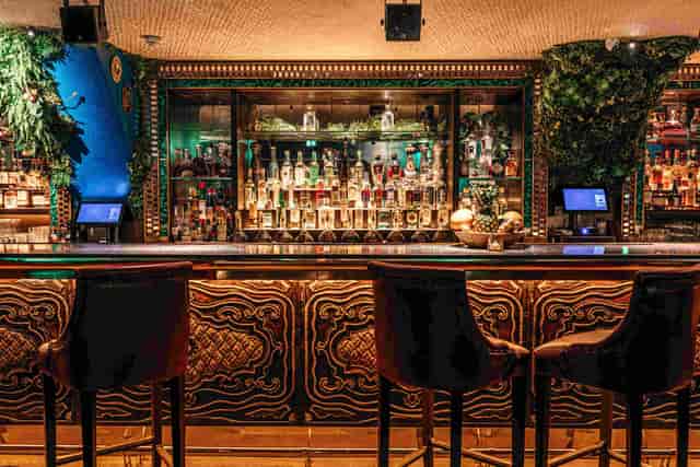Pisco Bar at COYA Doha, ornate design, ideal for networking and social events.