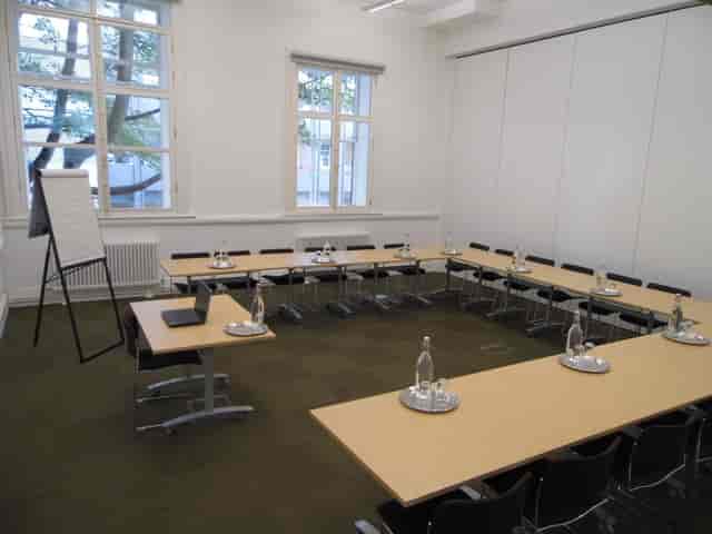 F12 Meeting Room at Friends' Meeting House, U-shaped tables for workshops and meetings.