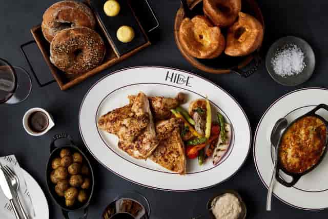 Elegant table setting with grilled fish for upscale brunch or corporate event.