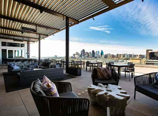 Stylish Upside West Village rooftop lounge with skyline views for upscale events and networking.