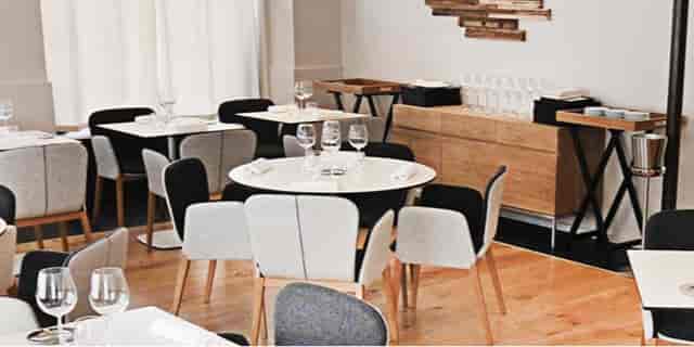 Stylish dining setup at Takao Takano Restaurant for intimate meetings and events.