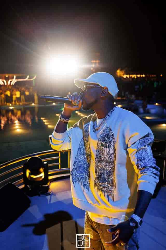 "Dynamic live performance at BLU Oasis outdoor event with vibrant lighting and engaging atmosphere"