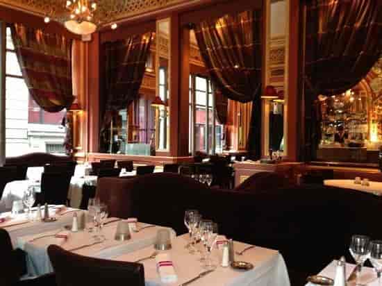 Elegant dining at Grand Café des Négociants, perfect for upscale events and intimate meetings.