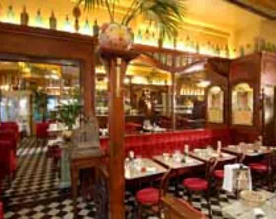 Cozy restaurant interior with wooden accents, perfect for intimate gatherings or team lunches.