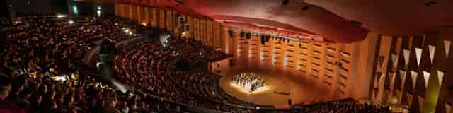 Lower Atrium, Auditorium de Lyon, concert hall with engaged audience, cultural events.