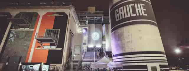 Salle de concert at Le Sucre, featuring industrial silos for contemporary event experiences.