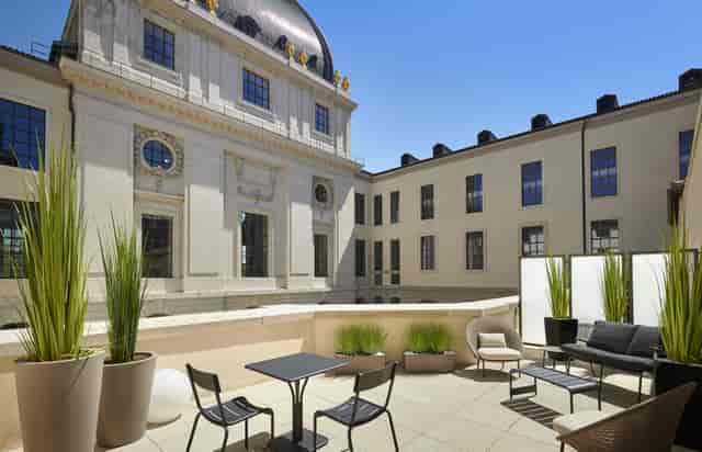 Stylish outdoor terrace at InterContinental Lyon Hotel Dieu for networking events.