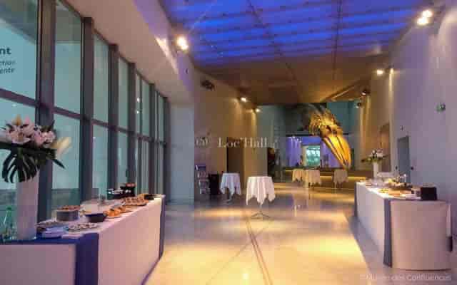 Modern event space in Musée des Confluences, perfect for corporate receptions and gatherings.