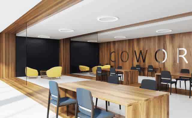 Modern coworking space with natural light in Algyr Centre Affaires meeting room.