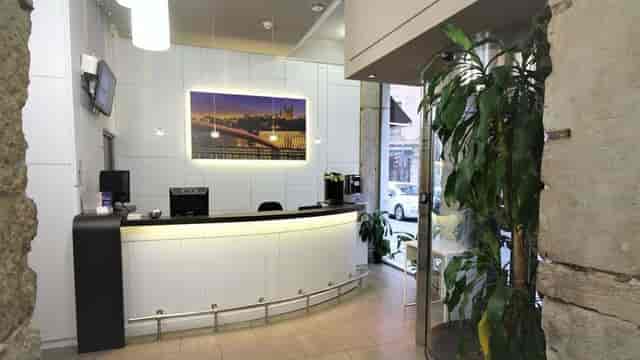 Modern reception area in Best Western Lyon Saint-Antoine for corporate events and meetings.