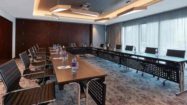 Modern meeting room at Park Regis Business Bay for professional gatherings.