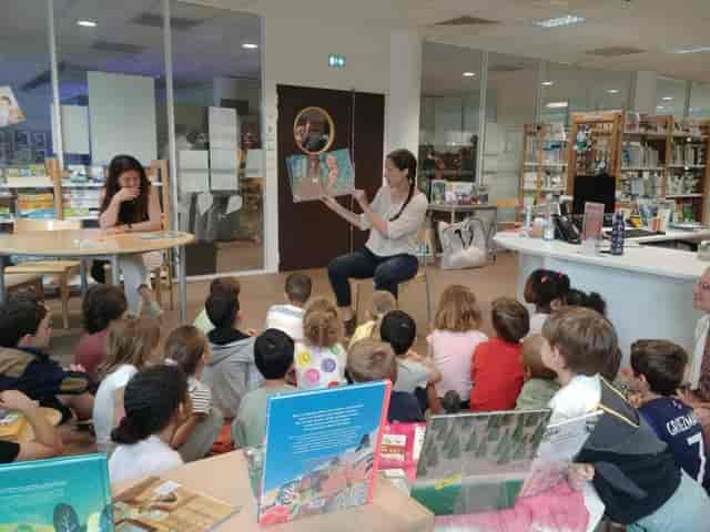 Library storytelling session with engaging presenter for children's literary events.