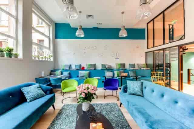 Creative Painting Workshop lounge with colorful decor, ideal for collaborative meetings.