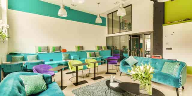 Creative Painting Workshop in vibrant, colorful event space for networking and collaboration.