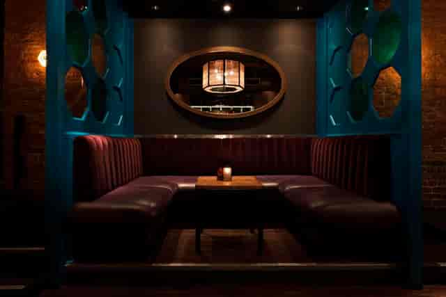 Raised VIP area at Dirty Martini Covent Garden, cozy booth for networking events.