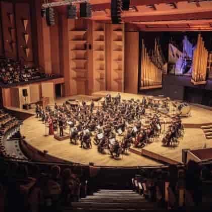 Orchestra performs in the Grande salle, Auditorium de Lyon, perfect for corporate events.