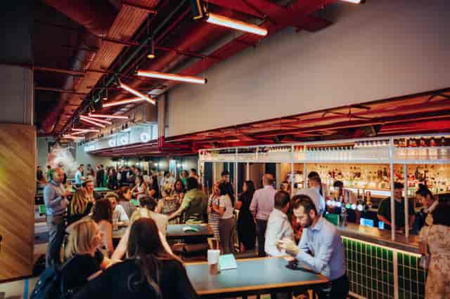 Vibrant networking venue at Bounce Battersea Power Station with modern decor and lively atmosphere.