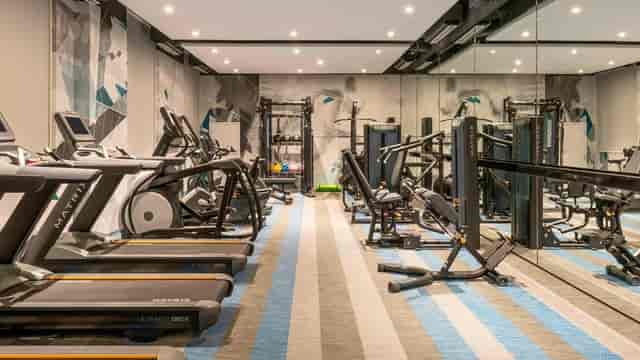 Modern fitness center at Tactic 5, Aloft Dubai Creek - ideal for wellness events and networking.