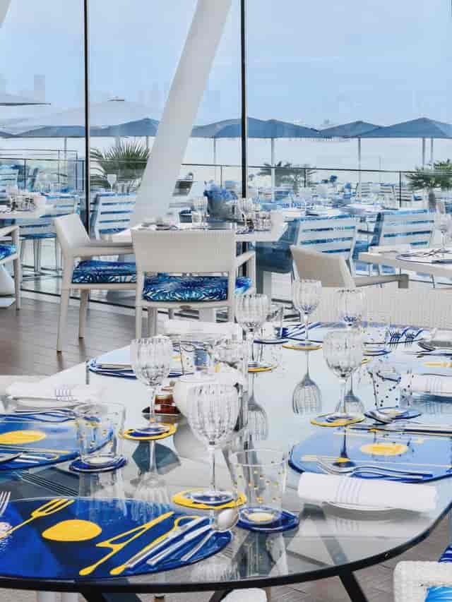 Stylish dining suites at Jumeirah Burj Al Arab for upscale events with stunning glass views.