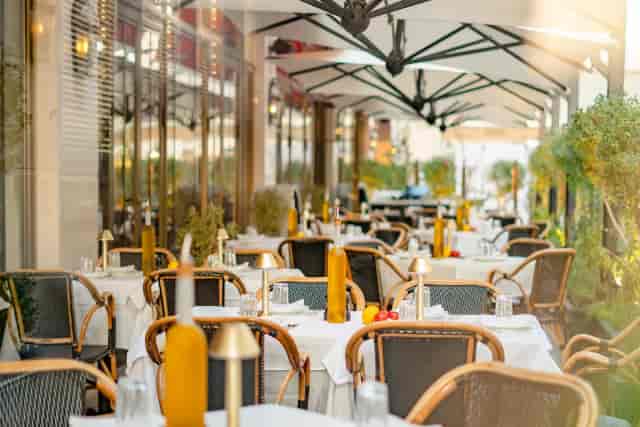 Al fresco dining area at LPM Riyadh with elegant tables, perfect for events and gatherings.