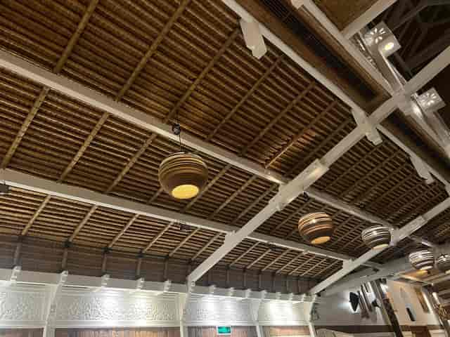 Elegant restaurant venue with wooden beams, perfect for corporate events and receptions.