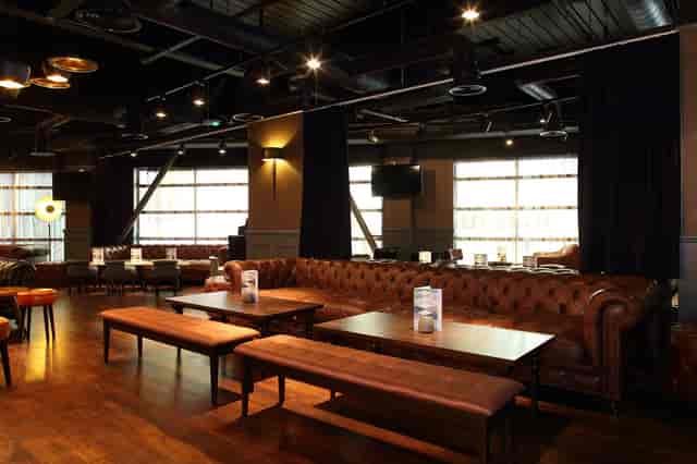 ABO Lounge at All Bar One - The O2, featuring leather seating for networking events.