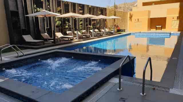 Luxurious outdoor pool at Citadines Abha ideal for social events and gatherings.