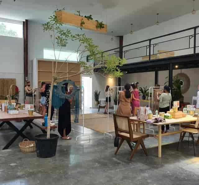 Art cafe in Ivy's Secret Garden, featuring inviting greenery for workshops and receptions.