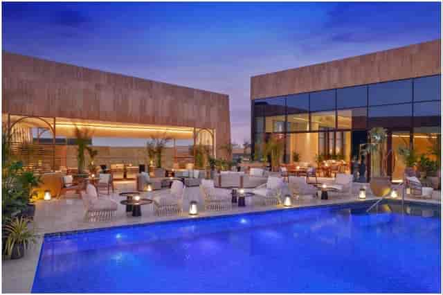 VIP Lounge at St. Regis Riyadh: elegant outdoor event space with pool for upscale gatherings.