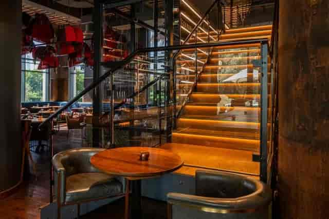 Private dining room with warm lighting ideal for upscale events and gatherings.
