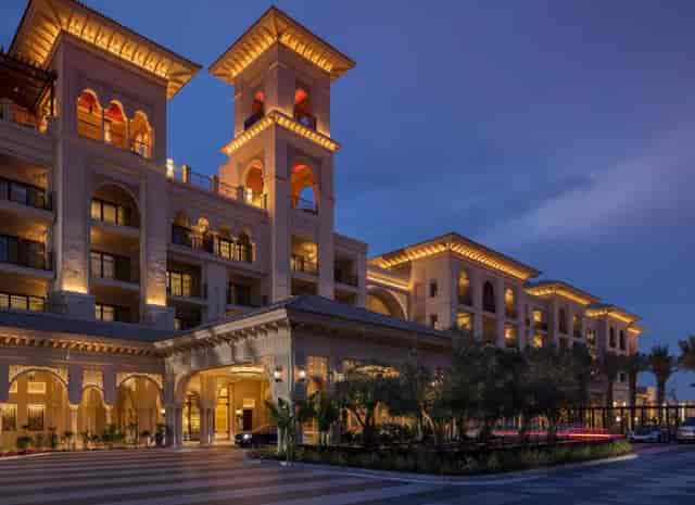 Luxurious hotel facade at Four Seasons Resort Dubai, ideal for corporate events and weddings.