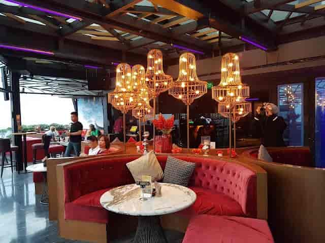 Cloud Dining & Lounge: modern venue with plush seating for upscale events and gatherings.